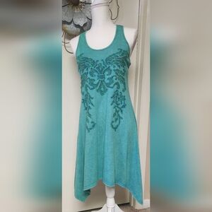 Vocal Teal Garment with Fleur-de-Lis Design